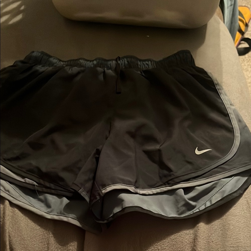 green and black nike shorts